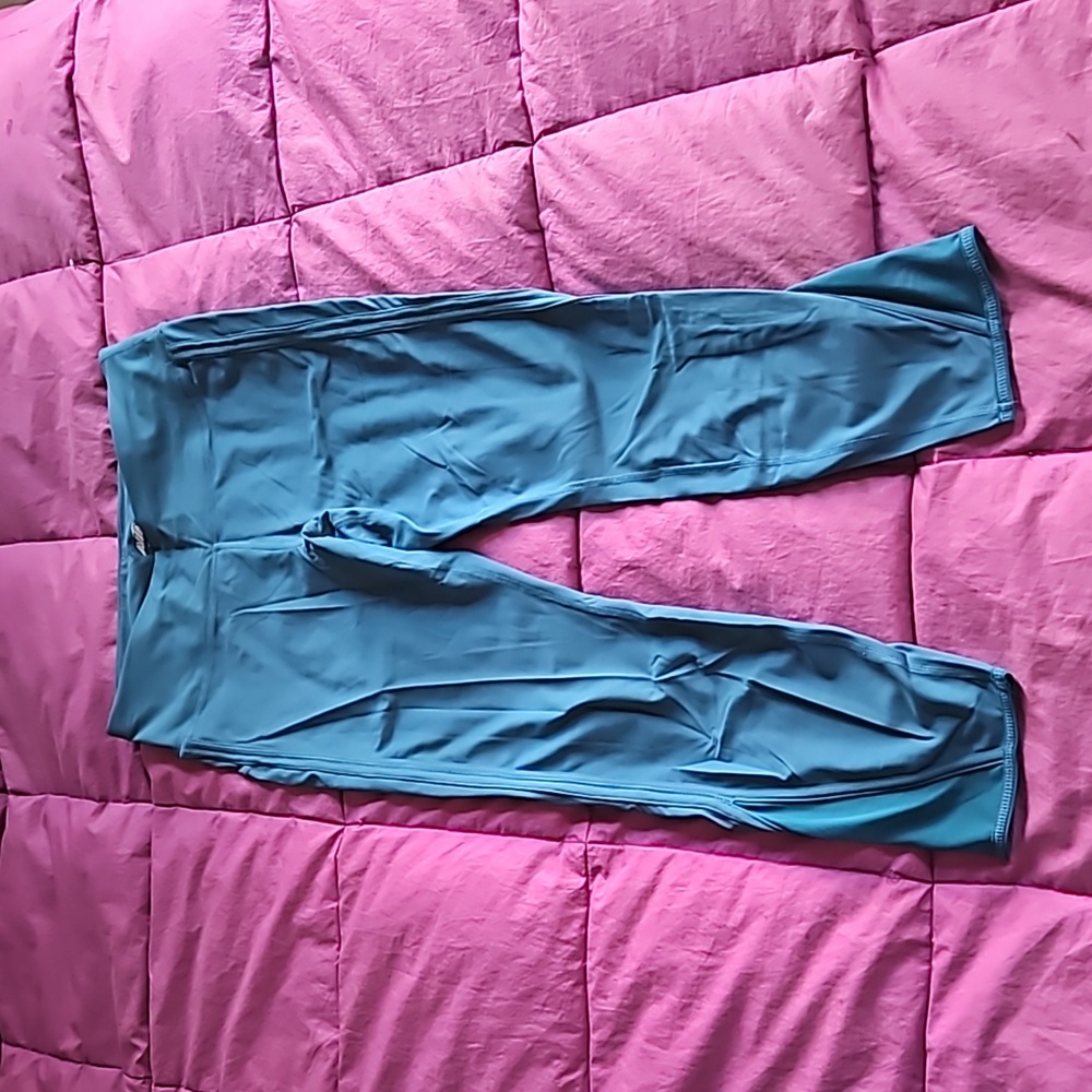 Avia teal leggings with wide waistband, key pocket, & mesh insert on calf size L